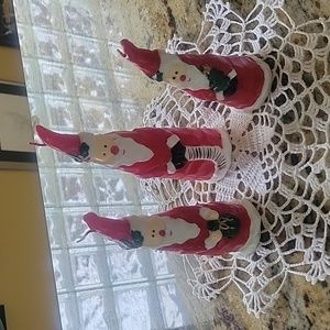 Three super cute Santas candles